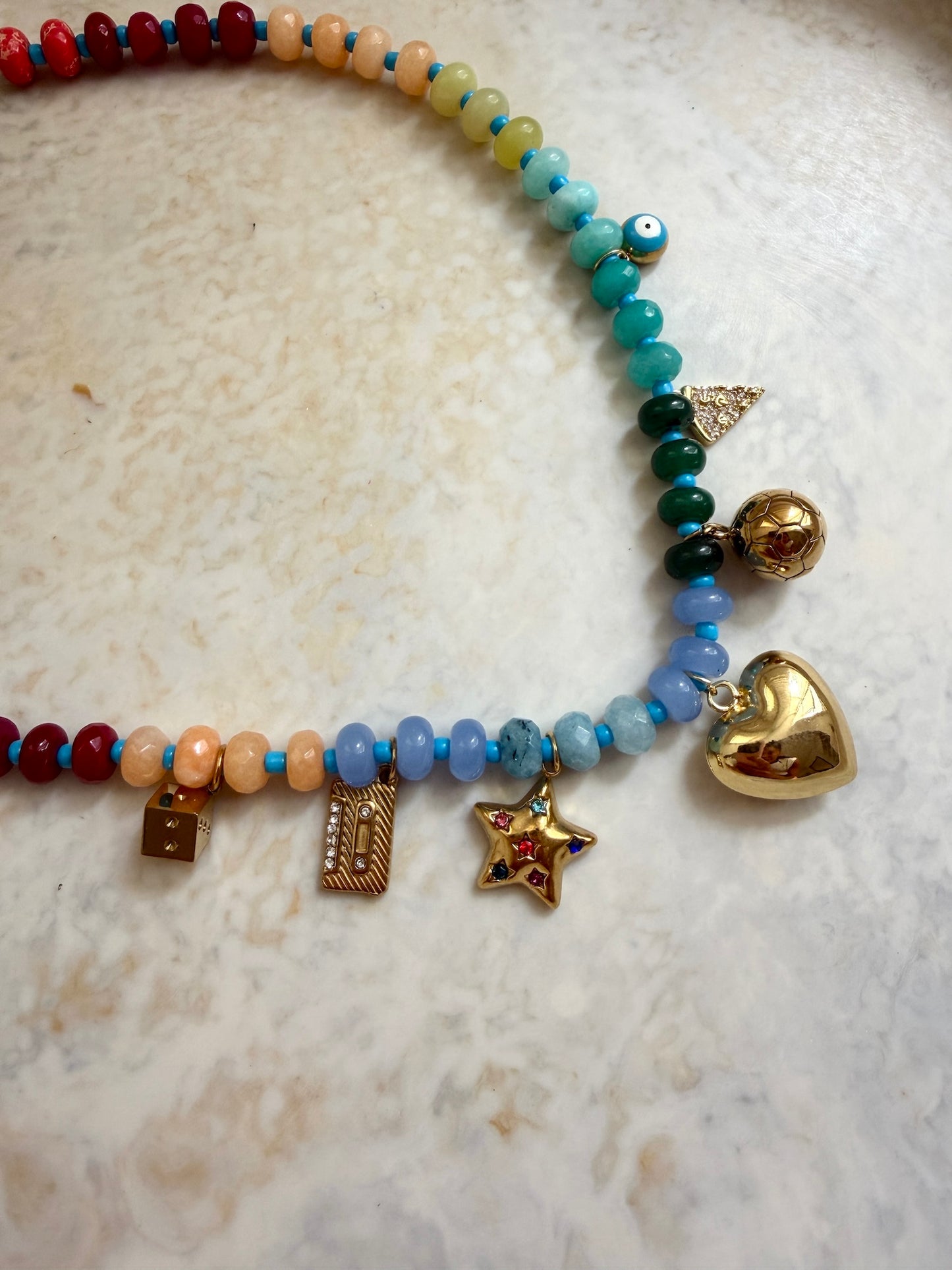 Sunlit beaded charm necklace